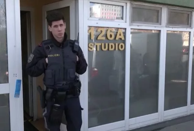 Police stand guard at the crime scene at Asia Studio In Vienna