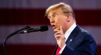 Trump predicts November 'Judgment Day' for critics in CPAC speech