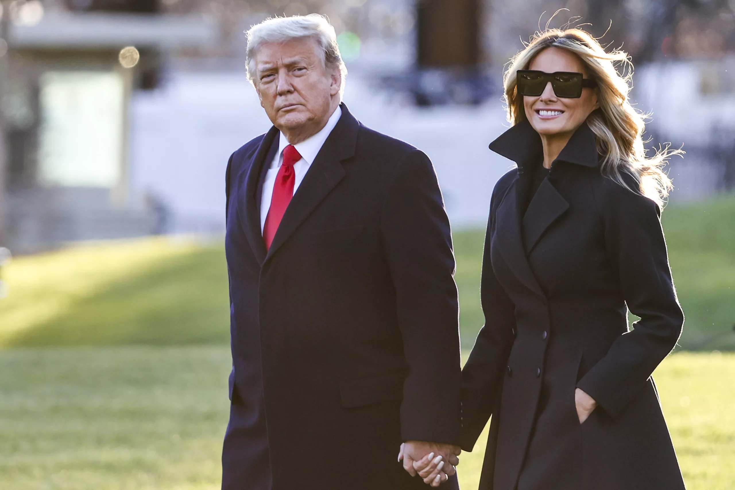 Melania, seen walking with former President Donald Trump on the White House lawn in December 2020, is remember for her impeccable fashion