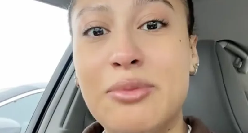 A TikTok user tearfully shared her experience with a frozen SoFi account