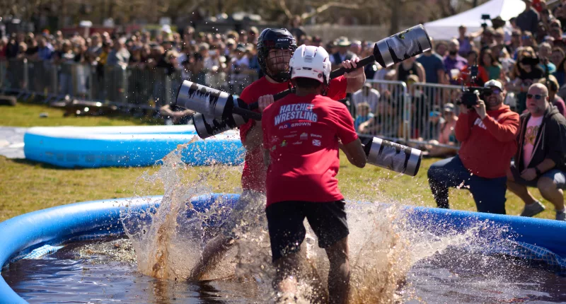 Contestants tested their strength in the weaponized pool noodle mud duel