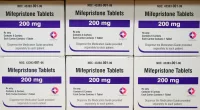 FILE - Boxes of the drug mifepristone sit on a shelf at the West Alabama Women