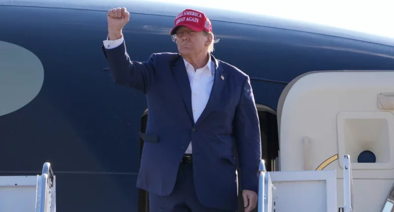 Republican presidential candidate former President Donald Trump gestures towards the crowd at a campaign rally Saturday, March 16, 2024, in Vandalia, Ohio. (AP Photo/Jeff Dean)
