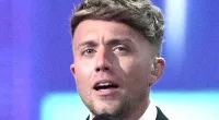 BRIT Awards host Roman Kemp makes savage dig at Christian Horner as viewers are left cringing over his 'awkward' antics