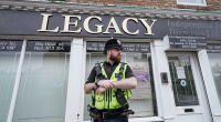 British police remove 34 bodies from England funeral home; 2 arrested for fraud, preventing burial