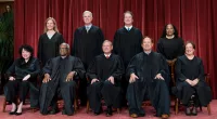 FILE - Members of the Supreme Court sit for a new group portrait following the addition of Associate Justice Ketanji Brown Jackson, at the Supreme Court building in Washington, Oct. 7, 2022. Bottom row, from left, Justice Sonia Sotomayor, Justice Clarence Thomas, Chief Justice of the United States John Roberts, Justice Samuel Alito, and Justice Elena Kagan. Top row, from left, Justice Amy Coney Barrett, Justice Neil Gorsuch, Justice Brett Kavanaugh, and Justice Ketanji Brown Jackson. (AP Photo/J. Scott Applewhite, File)