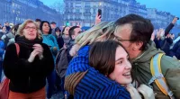 Pro-abortion supporters hug each other after French lawmakers have approved a bill that will enshrine a woman’s right to an abortion in the French Constitution, at Trocadero Plaza in Paris, Monday, March 4, 2024. The vote makes France the first country to have a constitutional right to abortion since the former Yugoslavia inscribed it in its 1974 constitution. (AP Photo/Oleg Cetinic)