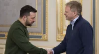Ukrainian President Volodymyr Zelenskyy, left, and Britain’s defence secretary Grant Shapps shake hands during their meeting in Kyiv, Ukraine on March 7