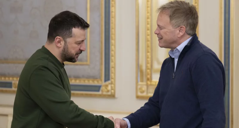 Ukrainian President Volodymyr Zelenskyy, left, and Britain’s defence secretary Grant Shapps shake hands during their meeting in Kyiv, Ukraine on March 7