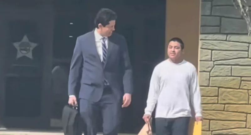 Virgilio Aguilar Mendez, and his attorney walking