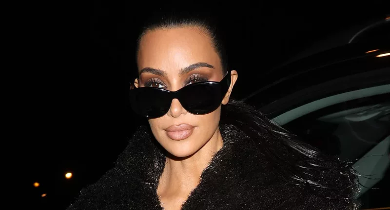 Kim Kardashian exudes glamour in a black faux-fur coat