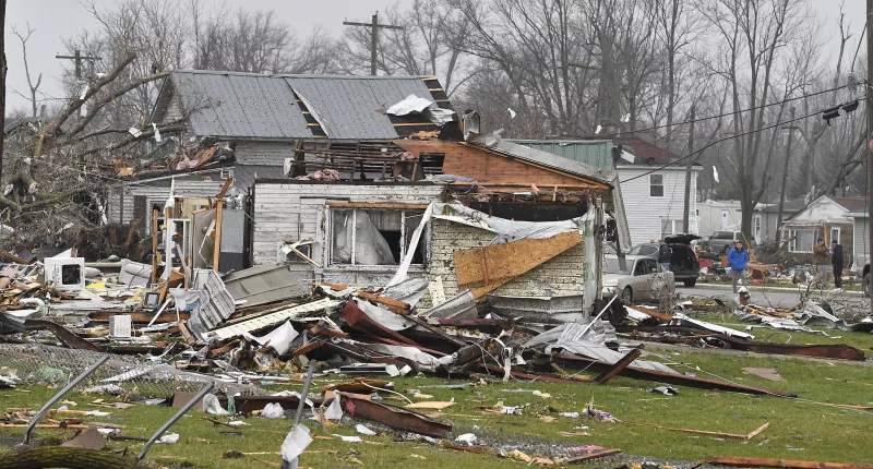 An extreme storm has devastated parts of the Midwest and at least three people have died