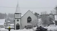 Stretch of I-80 shut down as monster blizzard dumps snow on mountains in California and Nevada