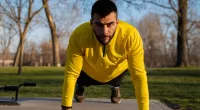 man doing pushups. concept of no-equipment workout for upper-body strength