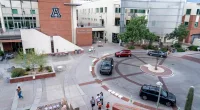 University of Arizona president takes voluntary pay cut as school grapples with financial woes