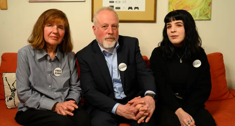 (L-R) Evan Gershkovich's parents and sister, Ella Milman, Mikhail Gershkovich, and Danielle Gershkovich, sit for a portrait in Philadelphia, Pennsylvania on February 27, 2024