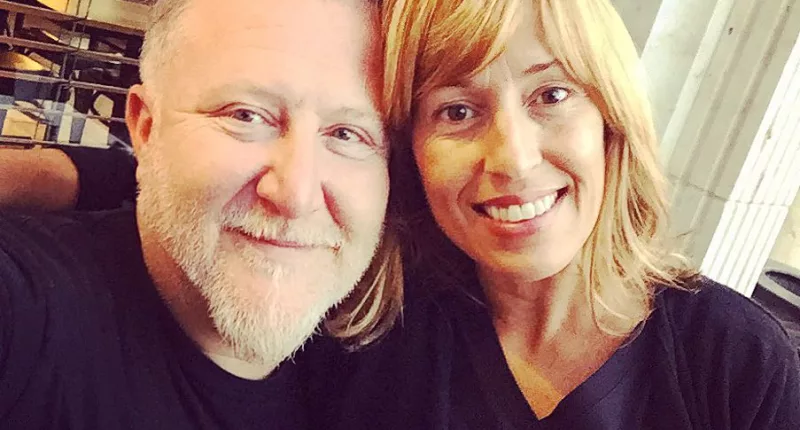 Monica Sementilli (right) is pictured smiling with her late husband, renowned hairstylist and haircare executive Fabio Sementilli (left) during their marriage