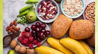 numerous high fiber foods for weight loss on a gray background