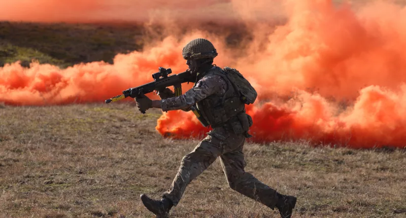 A British soldier storms an enemy position during the Nato military exercises in Poland