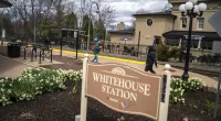 People are seen walking around the train station on April 5, 2024, in Whitehouse Station, New Jersey, the epicenter of a 4.8 magnitude late-morning earthquake