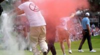 Climate protesters tackled after storming 18th green at PGA Tour event