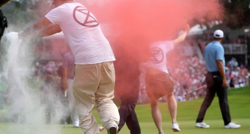 Climate protesters tackled after storming 18th green at PGA Tour event