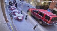 A major manhunt is underway for a man who stole a car in a Melbourne laneway. The owner was left with serious injuries after he clung onto the bonnet of his car to stop thief from driving off.