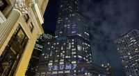 "Project 2025 HQ" projected onto the outside of the Trump Hotel before the Democratic National Convention in Chicago.