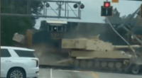 Shock video captures the moment the train hits the vehicle