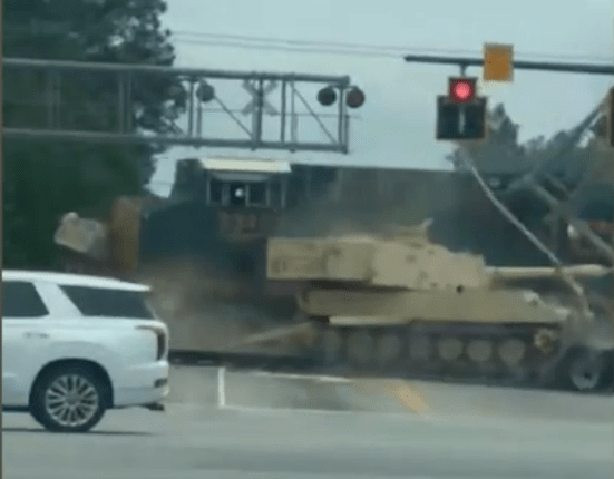 Shock video captures the moment the train hits the vehicle