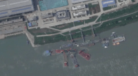 Satellite imagery from June of what appears to be floating cranes at a shipyard near Wuhan where the Chinese Zhou-class submarine sank earlier this year