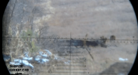 The Ukrainian sniper can be seen aiming at the Russian soldiers who were ready to blitz his position with RPGs