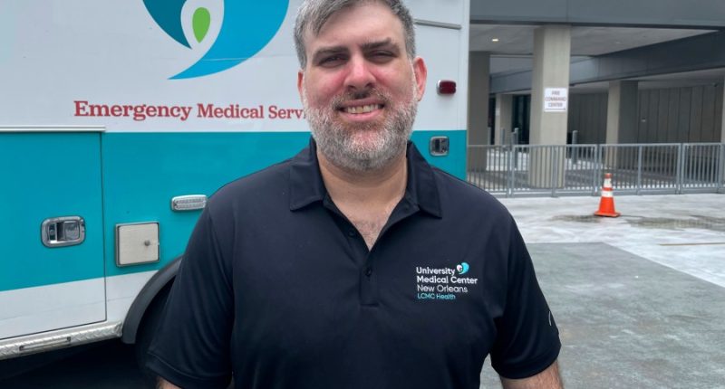 An ER nurse says it was 'second nature' to rescue a man trapped in hurricane floodwaters