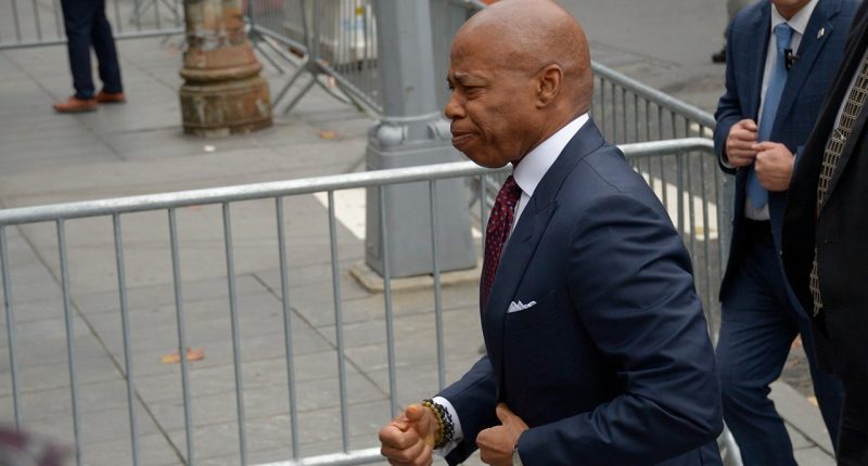 NYC Mayor Eric Adams arrives to turn himself in to face charges in federal corruption case