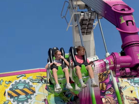 Ally Metzger watched helplessly as her kids dangled up in the air for 15 minutes