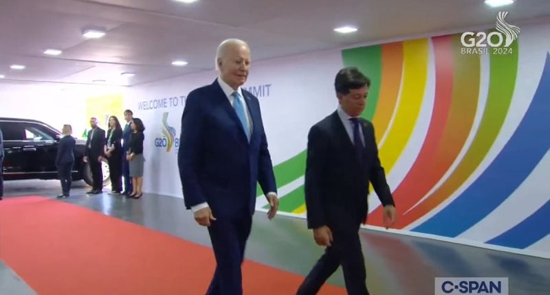 Bizarre moment Biden veers to the side and avoids the red carpet