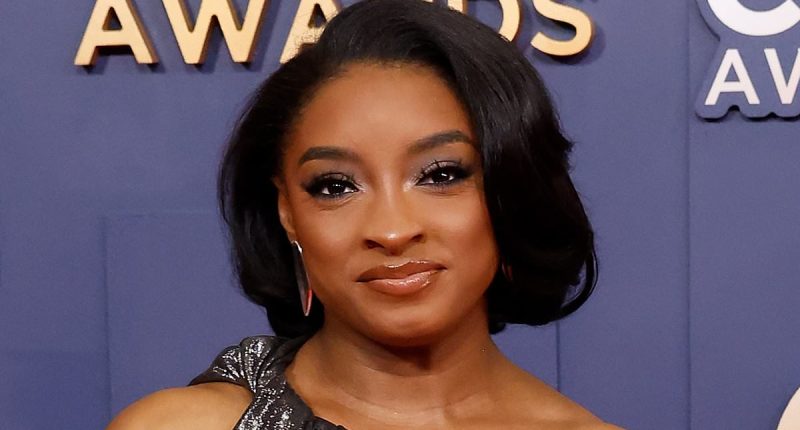 Fans accuse Simone Biles of 'dirty' and 'disrespectful' reaction to country music legend's wife during CMAs