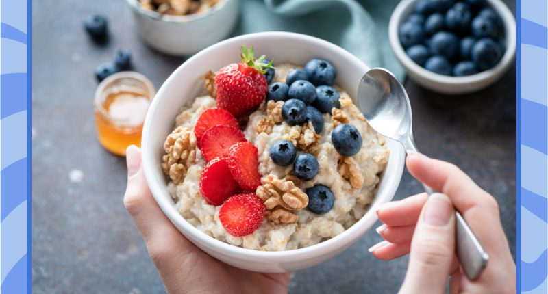 bowl of oatmeal with strawberries blueberries walnuts for weight loss