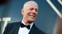 Bruce Willis shakes hands with first responders in rare appearance