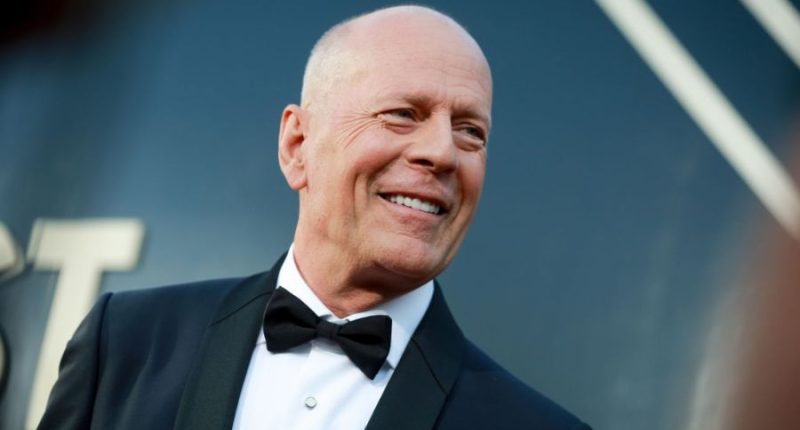 Bruce Willis shakes hands with first responders in rare appearance