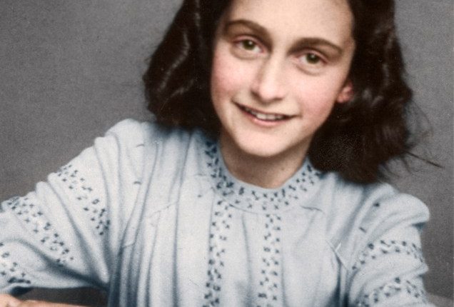 Black and white photo of Anne Frank.