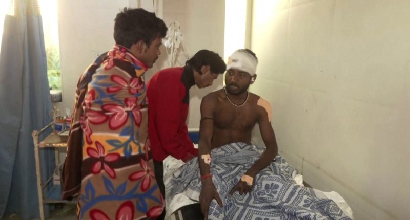 At least 12 train passengers killed in India after jumping onto tracks to flee alleged fire