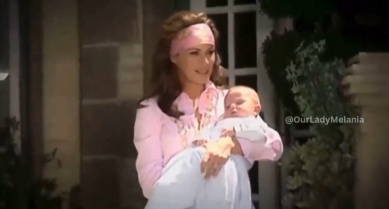 Melania Trump holding baby Barron Trump.