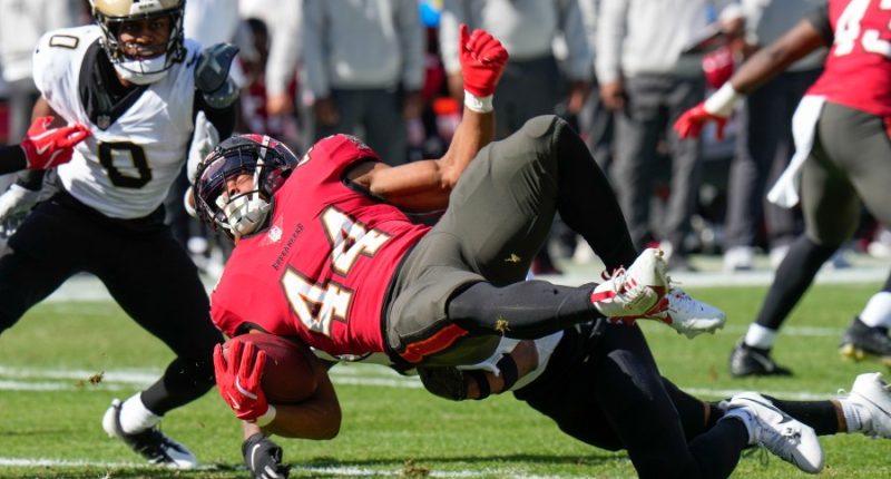 Buccaneers beat Saints 27-19 to clinch NFC South and wide receiver Mike Evans surpasses 1,000 yards