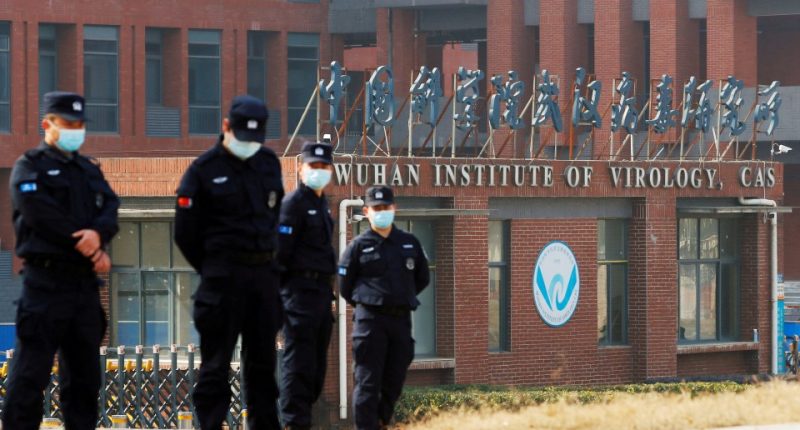Security personnel outside the Wuhan Institute of Virology.