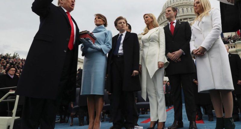Donald Trump being sworn in as the 45th president of the United States, with his family.