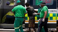 Dozens of survivors and dead pulled from abandoned South African mine as hundreds remain underground