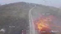 Drone footage of a Ukrainian drone attacking Russian drones.