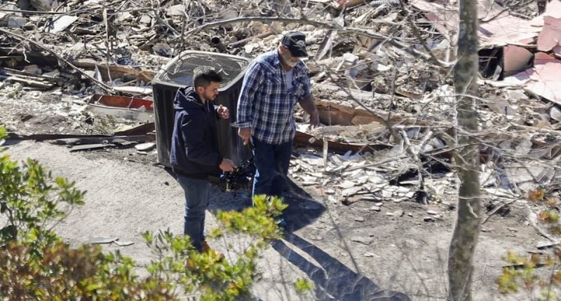 Emotional Mel Gibson surveys smoldering remains of his Malibu house