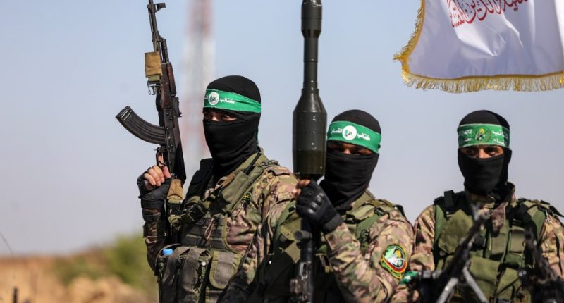 Hamas fighters in military parade.